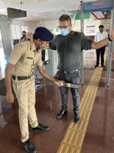 Frisking of Passengers through Door Frame Metal Detector & Hand Held Metal Detector